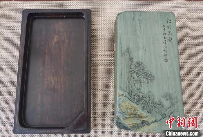 圖為盧保勝為提升洮硯文化內(nèi)涵，制作“一硯一銘、一盒一拓”成品展示。　張婧 攝